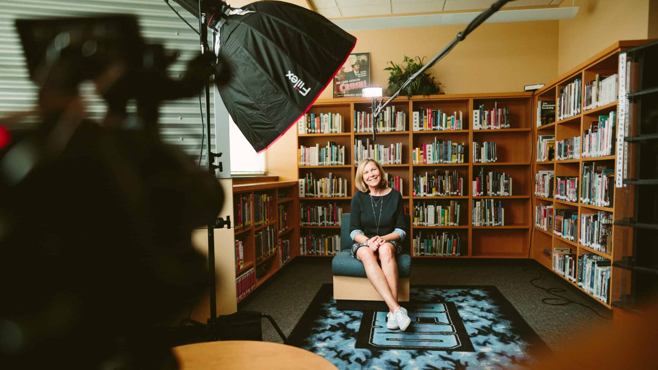 Video of a woman in library